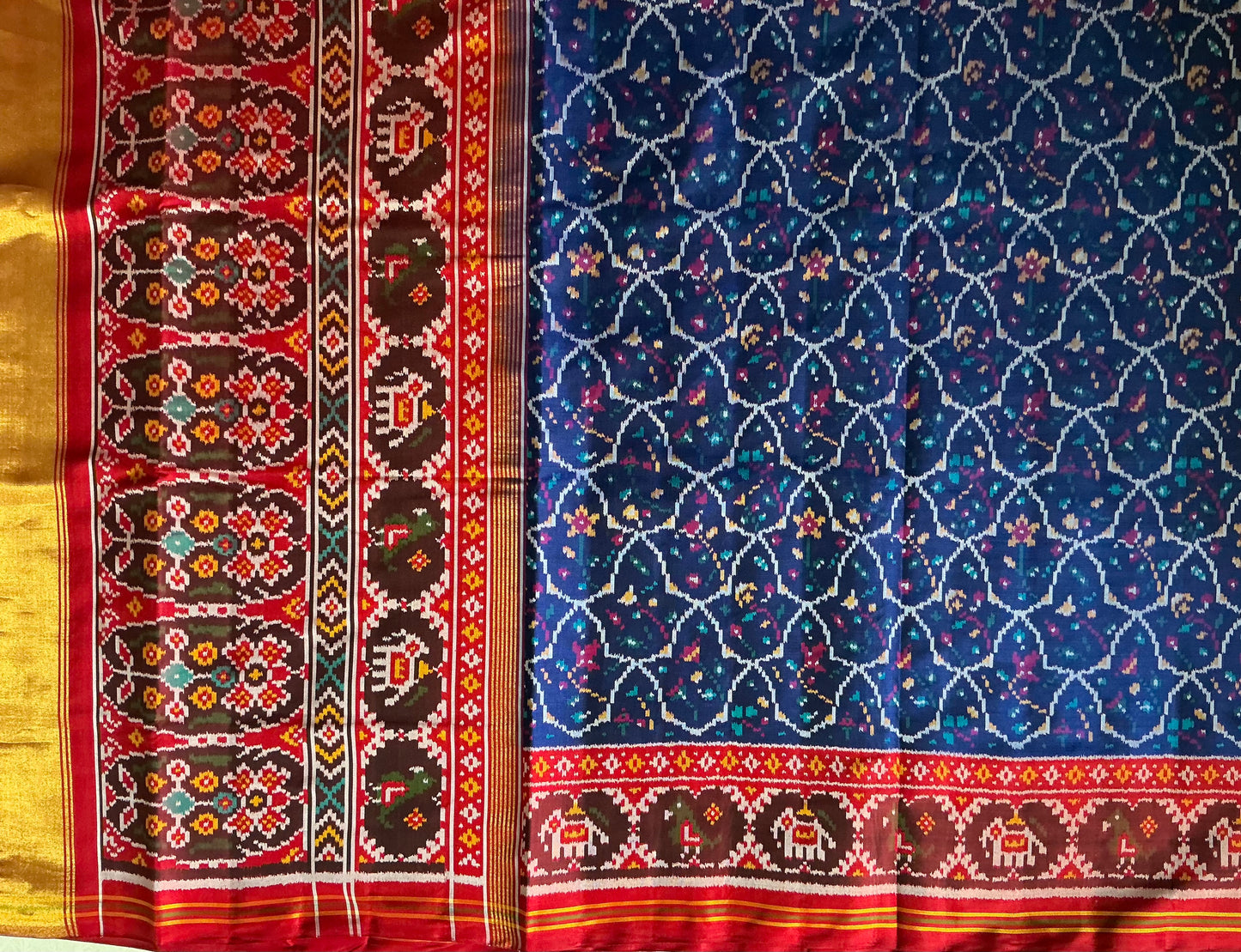 New fancy blue colour Patan Patola First Copy Semi Ikkat Patola Saree