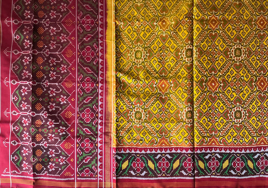 Manek Chowk yellow colour Tal, with beautiful tree full border,Patan Patola First Copy Semi Ikkat Patola Saree.