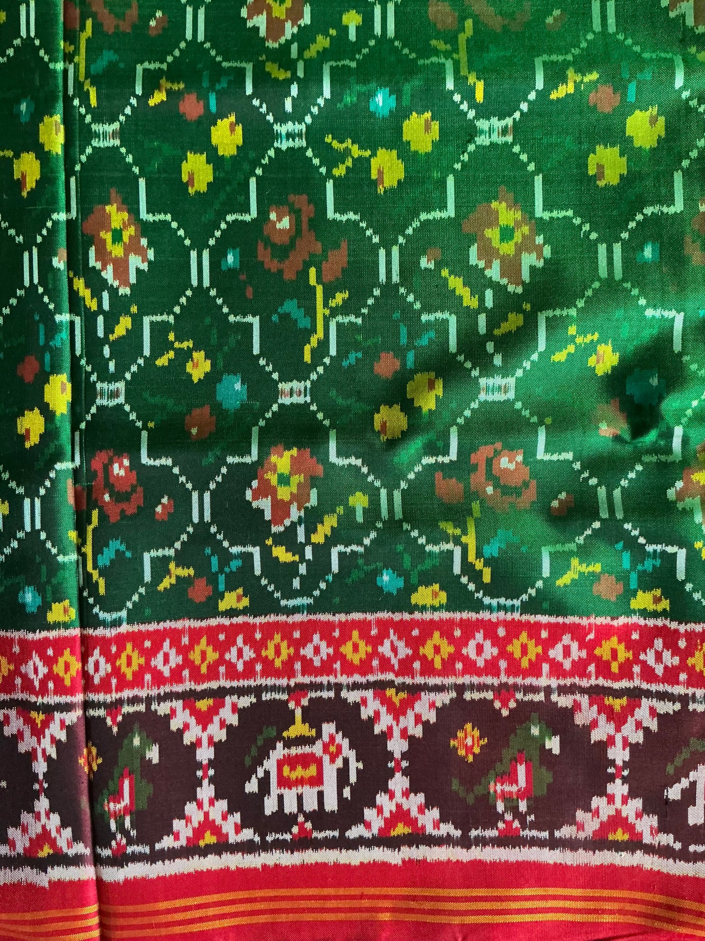 Brand new green Tal fancy Sal in rose Patan Patola First Copy Semi Ikkat Patola Saree.