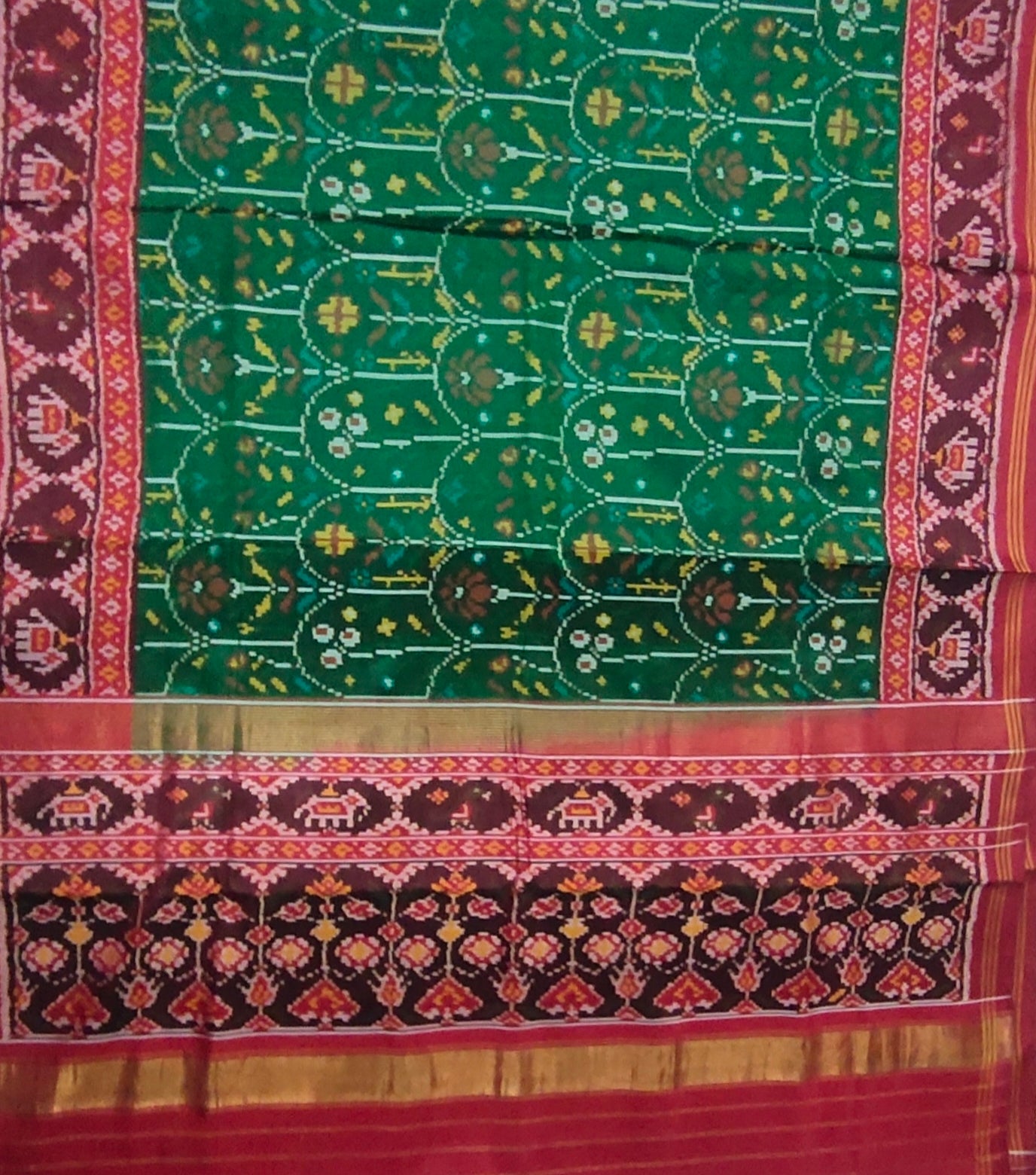New fancy flower green tal Patan Patola First Copy Semi Ikkat Patola Saree